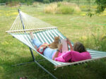 Catherine Friend writing in a hammock